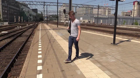 Impatient student waiting for train Stock Footage 25771801