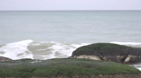 The impending wave on the rocks. Slow motion. Stock Footage 53085809