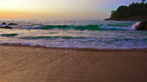 Impinging sea wave sunset background Video stock 33309674