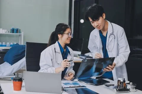 Implement those changes and we can see. Shot of a group of nurses and docto.. Stock Photos