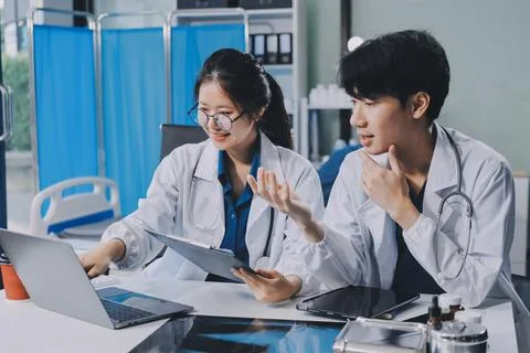 Implement those changes and we can see. Shot of a group of nurses and docto.. Stock Photos