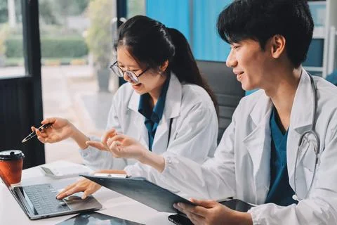 Implement those changes and we can see. Shot of a group of nurses and docto.. Foto stock