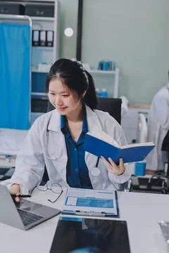 Implement those changes and we can see. Shot of a group of nurses and docto.. Stock Photos