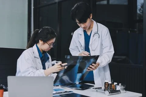Implement those changes and we can see. Shot of a group of nurses and docto.. Stock Photos
