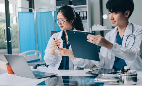 Implement those changes and we can see. Shot of a group of nurses and docto.. Foto stock