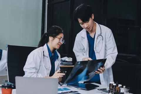 Implement those changes and we can see. Shot of a group of nurses and docto.. Stock Photos