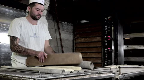 Implementation of the bread sticks on the carpet oven Video stock 56482472