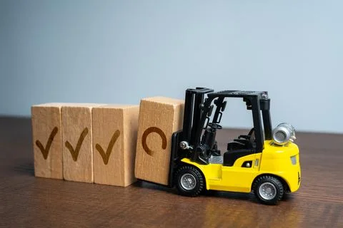 Implementation of new stages of the project. The forklift truck performs th.. Stock Photos