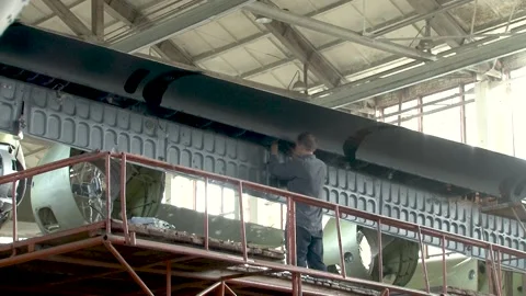 Implementation of resource bulletins on wing of An-12BK transport aircraft. Stock Footage 206043034