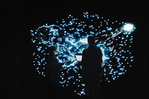 Implementing AI algorithms, deep learning system and team of technicians Stock Photos