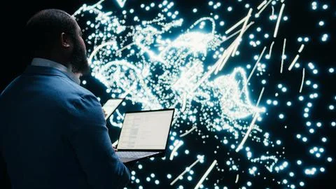 Implementing deep learning algorithms, laptop and data scientists in AI startup Stock Photos