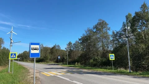 Implementing street lamps that use solar and wind energy can significantly Stock Footage 316834795