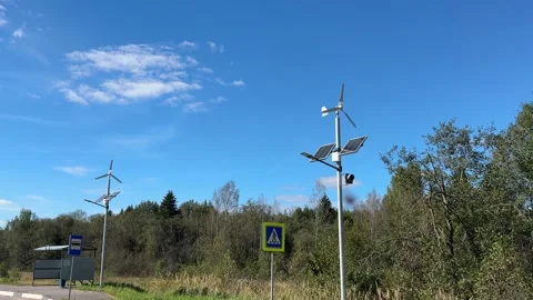 Implementing street lamps that use solar and wind energy can significantly Stock Footage 316834861
