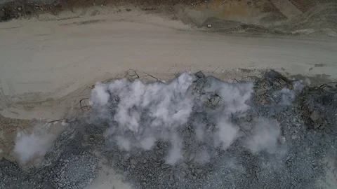Imploding works . Undermining career. Explosion. Aerial view. Stock Footage 99688006