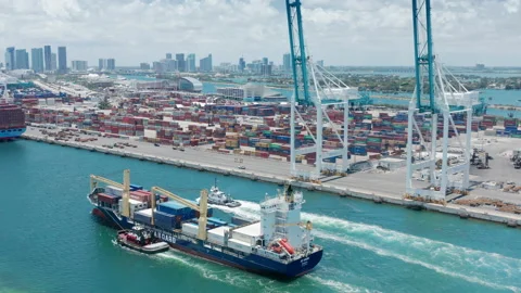 Import and export, cargo ship with Miami downtown and port on motion background. 스톡 동영상 149994766