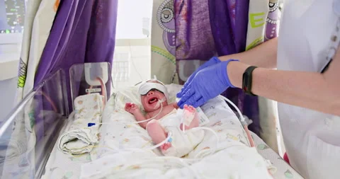 The importance of caring for a newborn within a specialized neonatal unit is Stock Footage 290808450