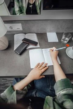 Importance of handwritten notes in the learning process. flat lay Stock Photos