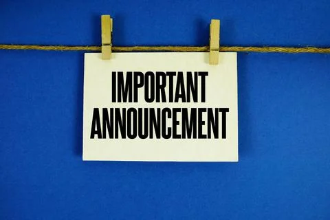 Important Announcement paper notes hanging on the rope with clothespins Stock Photos
