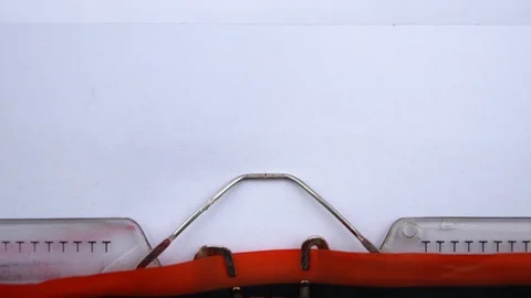 Important assumptions - phrase printed on an old typewriter in red letters Stock Footage 126644837