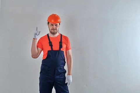 An important engineer in white gloves raised his hands up Foto stock