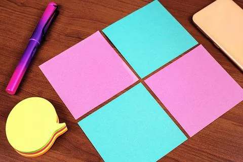 Important Informations Written On Four Different Notes On Desk With Cellphone Stock Photos