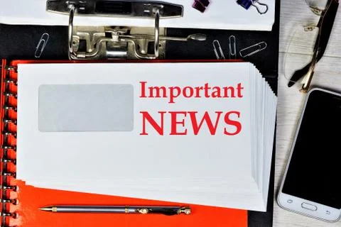 Important news-a text message on a mail envelope. Stock Photos