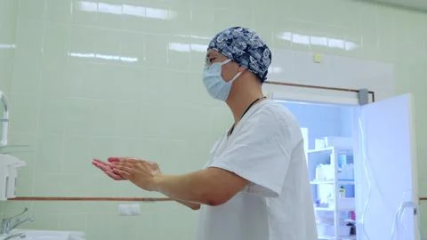An important step in the surgeon's preparation before surgery is thorough Stock Photos