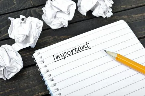 Important text on notepad Stock Photos