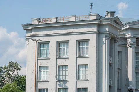 Imposing, concretestone building with classical elements, multiple windows,.. Foto stock