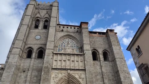 Imposing gothic cathedral of avila facade tilting upward Vídeo Stock 340326567