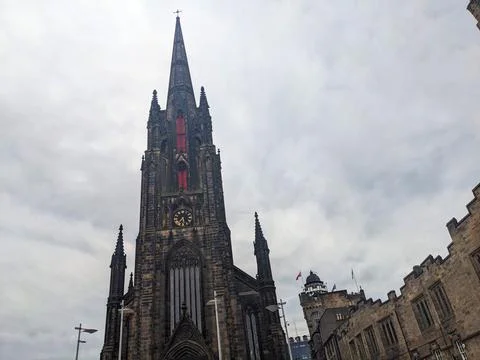 Imposing Gothic spire of The Hub, a notable landmark on the Royal Mile in Stock Photos