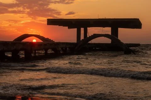 Imposing Structure on the Sea at Sunrise Stock Photos