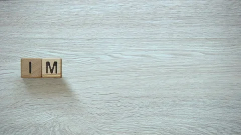 Impossible changes to possible, stop motion word on wooden cubes, possibilities 스톡 동영상 101870254