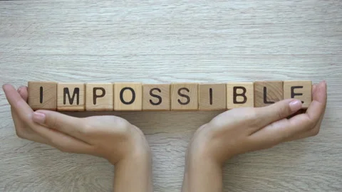 Impossible, hands pushing word on wooden cubes, lost opportunities, disability 스톡 동영상 101866534