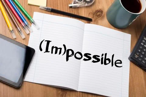 (Im)possible - Note Pad With Text On Wooden Table Stock Photos