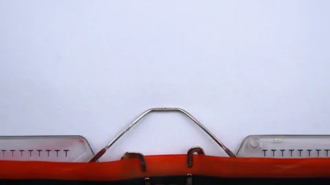 Impossible - word printed on an old typewriter in red letters, close up. Stockbeeldmateriaal 126644848