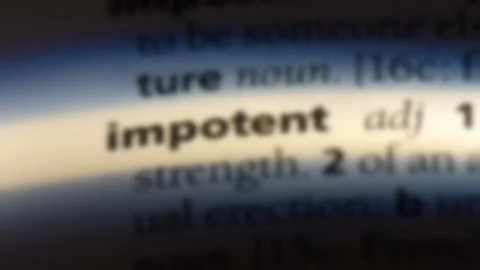 Impotent word in a dictionary. Stock Footage 99560914