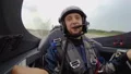 Impressed male passenger of sports plane sitting at cockpit after extreme flight HD Footage