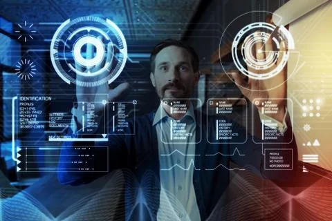 Impressed programmer touching two icons on the transparent screen Stock-Fotos