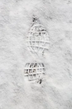 Impression of a Boot in Snow Stock-Fotos
