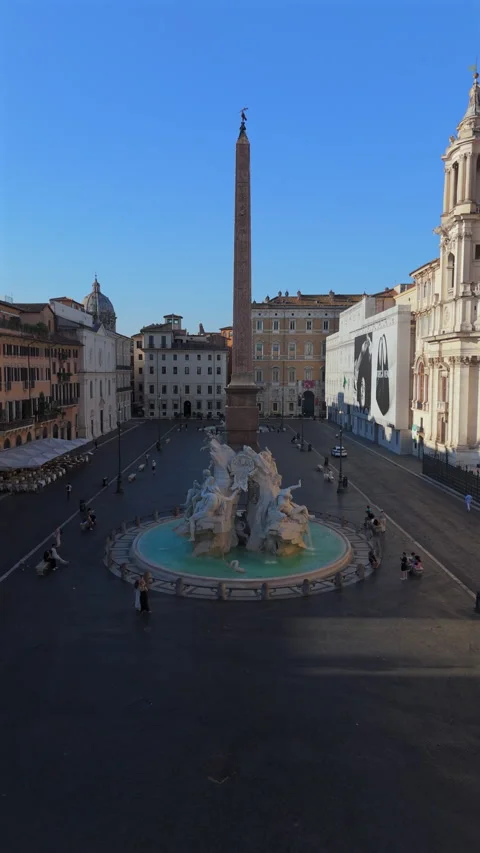 An impressive aerial drone view showcasing the beautiful Piazza Navona located 스톡 동영상 318053625