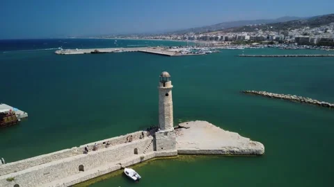 Impressive Aerial Orbit of Rethymno Lighthouse in 4K Stockbeeldmateriaal 249944165