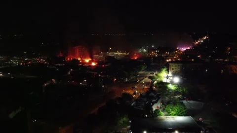 Impressive aerial sequence of burning city is the sight of racism in the 2000's Vidéo 134505951