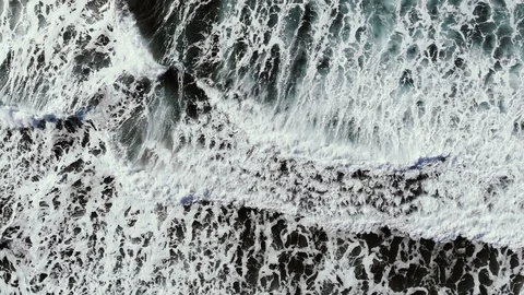 Impressive aerial view of splashing waves motion over turquoise blue sea water Stock Footage 120059499