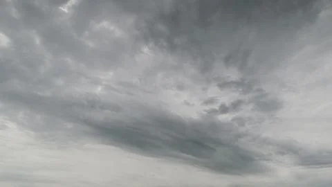 An Impressive and Dramatic Overcast Sky Filled with Various Shades of Gray Cloud Stockfoto's