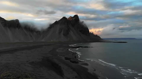 Impressive arial view of black sand beach in Iceland. Epic Vestrahorn mountains Stock Footage 169013225