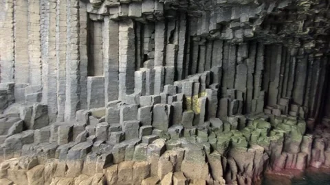 Impressive basalt rock formations within a dark cave, Staffa, Inner Hebrides, Stock Footage 287134378