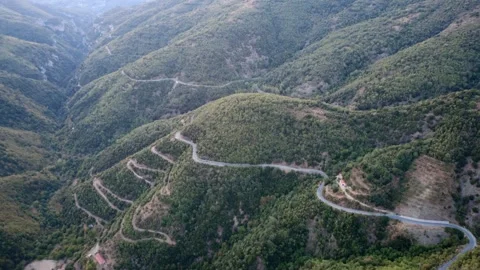 Impressive canyon with cliffs, sharp turns and dense vegetation in Greece Stock Footage 321590123