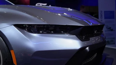 Impressive CloseUp of Sleek Silver Car Being Displayed at an Exciting Auto Show 스톡 동영상 291619199