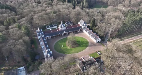 An impressive drone video of the stables at Royal Palace Het Loo, offering a Stock Footage 238023633